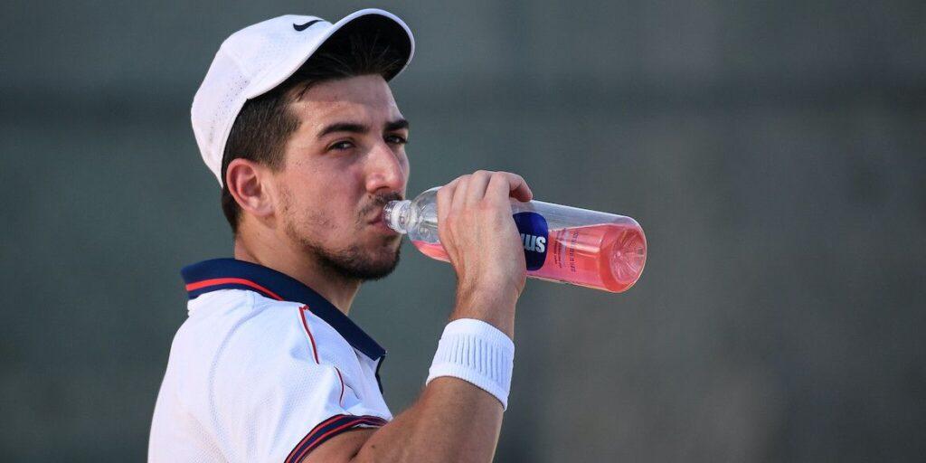 Tennis Player having Energy Drink